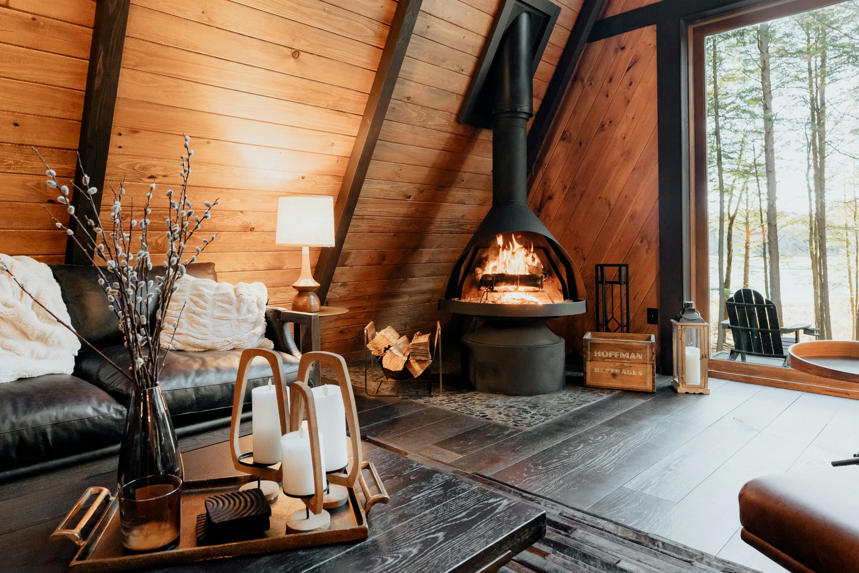 Interior of the DREAM HOUSE cabin in warm evening light